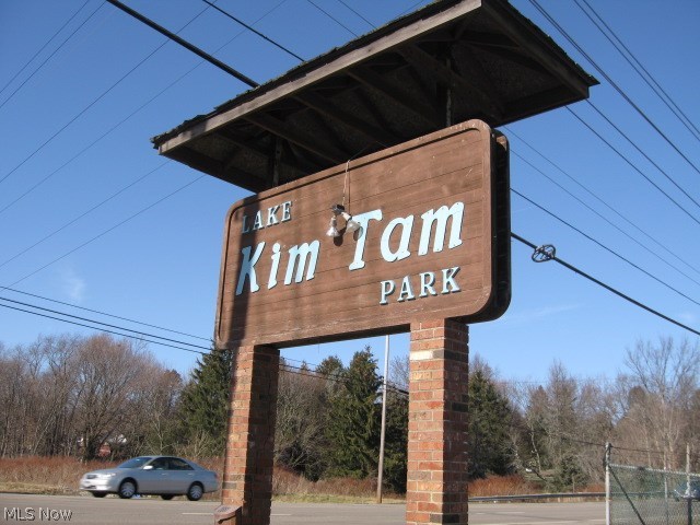 Take a look at his opportunity to own "Lake Kim Tam"! A swimming park that is well known in the area. It was originally established in 1960. 2 1/2 acre spring fed man-made lake features diving dock, children's swimming area & sandy beaches. Tennis courts, horse shoes, volley ball & baseball to add to the enjoyment & income. A great place to have family reunions, company picnics, special parties, group outings & much more. There are many picnic tables scattered thur out the grounds. Three excellent pavilions facilities to rent. Largest pavilion for 300 + people includes partial kitchen, walk in cooler, serving bar & restrooms. There is a large multi purpose building with locker rooms, showers, food concession & 2 apartments upstairs. Large parking lot, extra building with 3 garages & possible ice cream or frozen custard stand. Need someone who is wiling to bring this gorgeous setting back to its original glory!! Call for a private showing!
NOTE: There are 3 parcels totaling 13.57 acres