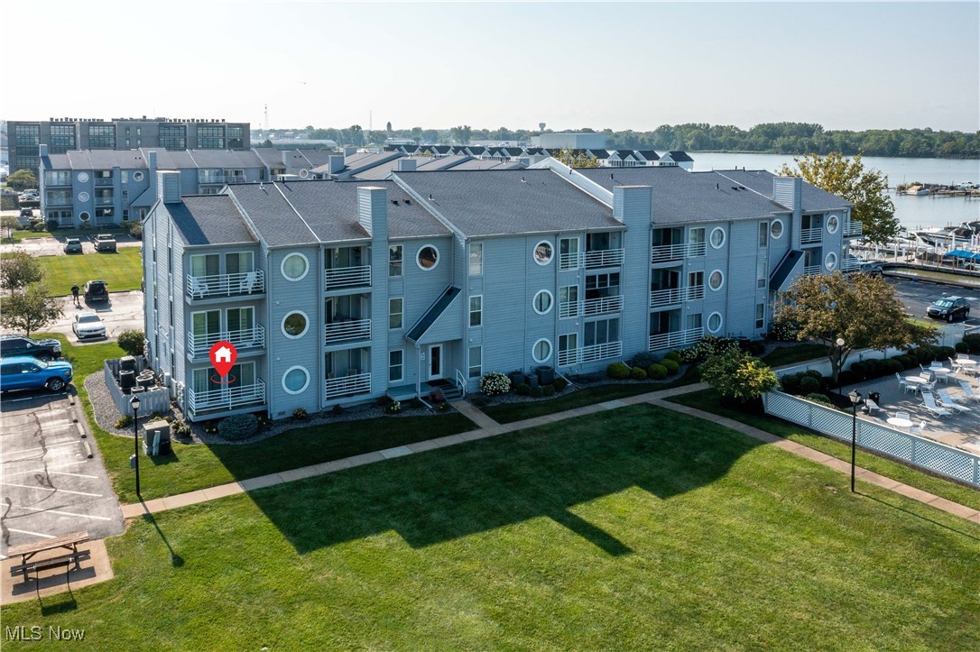 Experience waterfront living at its finest at Clinton Reef Club! This fully furnished, corner unit 1-bedroom condo offers stunning views of both Lake Erie and the community pool from not one, but two private decks! With a sleeper sofa, it comfortably accommodates up to four guests - perfect for personal use or as a potential Airbnb. The washer and dryer are convenient for extended stays. Included is a 35' dock in the newly updated marina, plus access to fantastic amenities like a community pool, bar, hot tub, grills and newly renovated clubhouse. A little walk will get you to downtown, the Jet Express and restaurants. Whether you're looking for a weekend getaway or an investment opportunity, this condo is move-in ready. Don't miss the video tour - your lakefront escape awaits!