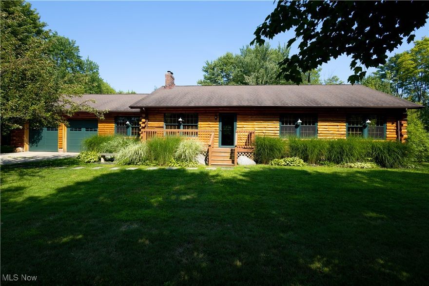 This 3 bed, 2 bath log cabin, located on 2.7 acres in Painesville Township is calling your name! As you approach the property, you’re met with a large, fully stocked pond surrounded by lush natural landscape. The beautiful, natural log home rises over the property, ready to welcome you inside. Upon entry to the home, you’re met with the open living space, featuring a beautiful
pellet stove with brick surround reaching the vaulted ceiling. The large living room is open to the updated, eat-in kitchen, which then opens to the large dining room with sliders to the large backyard. The dining room connects to the oversized two-car garage. On the opposite end of the home, a hallway takes you past the entrance to the full basement and the first of two full bathrooms. The hall bath features a large, glass-enclosed walk-in shower and built-in storage. Further down the hall is the primary bedroom with an attached bathroom and large closet. Two additional bedrooms round out the first floor. The full basement is home to a large, finished living area with built-in shelves and a wood-burning stove. This space includes a massive laundry/utility room, a recreation room with a pool table, and a huge workshop. Each of these spaces is limited only by your imagination! The beautiful backyard has a large storage shed, a basketball court, and plenty of space for relaxing and rejuvenation. The pool table and zero-turn mower stay with the home. This exciting home is sure to go fast - make your appointment to see it today!