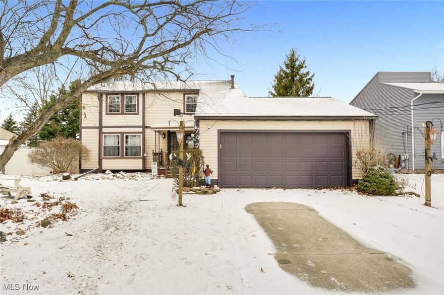 Welcome to 797 Bacon Rd — a rare gem nestled in one of Painesville Twp’s most family-friendly communities! This spacious 4-bedroom 2.5-bath home is thoughtfully designed for comfort, convenience, and long-term peace of mind. Step in from the covered front porch to an inviting open floorplan—a cozy family room with a gas fireplace sits to one side, while a large living room flows seamlessly into the dining room on the other. The kitchen boasts marble counters, newer appliances, and updated flooring, creating a bright and functional space for everyday cooking and entertaining. Upstairs, you’ll find four oversized bedrooms, each with ceiling fans and generous closets. The fully updated upstairs bathroom features marble floors and a luxurious Safe Step Walk-In Jetted Tub with Aromatherapy, Light Therapy. New carpet (2023) on the stairs and hallway adds a fresh, modern touch. A 2018 Acorn chair lift provides access to both the second floor and basement and can be removed if not needed. Multiple relaxing spaces make everyday living feel special: enjoy the covered back deck, an enclosed sunroom with eight sliding glass doors and skylights, and a charming front garden area with a fountain that enhances the home’s curb appeal. Recent upgrades offer exceptional value, including a newer furnace and AC (2 years old), 2019 windows, updated appliances, and a Generac whole-house generator. Additional highlights include a huge basement ready to design for recreation or workshop, a front shed with ramp—ideal for storage or small-vehicle parking—and a fully fenced-in backyard. This is more than a house—it’s the perfect place to call home. Don’t miss it!