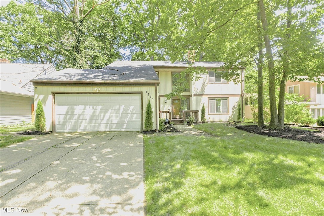 A beautiful, well maintained and updated Cleveland Heights home. Greeted by a welcoming foyer (where you'll find access to the first floor half bath and laundry with new washer/dryer 2023) leading to an open floor plan on the first floor between the family room, kitchen, dining and living rooms. Beautiful new kitchen with all new stainless steel appliances in 2023 including a gas stove, granite countertops, fresh white cabinetry and subway tile backsplash. Generous living space on the first floor with a formal living room complete with a brick, gas fireplace and a family room with beamed ceiling and amazing dual sliding doors that lead out to the deck. The second floor has four generous bedrooms including a primary suite complete with built-in closets and a private full bathroom. Another common full bathroom is off the upstairs hall; all bathrooms are updated with new vanities, fixtures and a bright fresh pallet. The basement is nicely finished with a great room and bonus room and has been fully waterproofed with new block windows. Great storage room with an additional 400 square feet of space (not included in the total). This home has luxury vinyl plank flooring throughout and has been made very efficient with newer windows, new furnace and air conditioner, a new roof and gutter guards, along with a new hot water heater and exhaust chimney liner. Enjoy the outdoors from the spacious deck complete with a gas line for easy grilling and privacy of the full, newly fenced backyard or relax on the front porch and visit with neighbors. Attached two car garage with a new door opener and springs is a nice feature of this property. Conveniently located with easy access to restaurants, retail, local schools/ universities, hospitals and just a short distance from downtown for a quick commute.