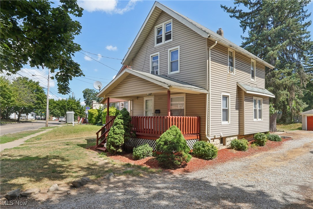 Investor opportunity! One of four homes available as part of a portfolio package. This 2-story property features 3 bedrooms, plus a finished attic that can serve as a 4th bedroom. Long-term tenant since 2015 with current rent of $850/month plus utilities, paid by AMHA. Features include a welcoming front porch, 2-car garage, patio, and natural woodwork throughout. Spacious living and dining rooms, a mudroom, and a full basement enhance the property's value.
