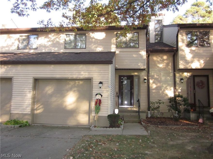 Move right in and enjoy this beautifully updated condo. Living room has vaulted ceilings and sliding glass doors that lead to cozy three seasons sunroom. Eat-in kitchen, spacious bedrooms, 1/2 bath on first floor, attached one car garage and full basement.