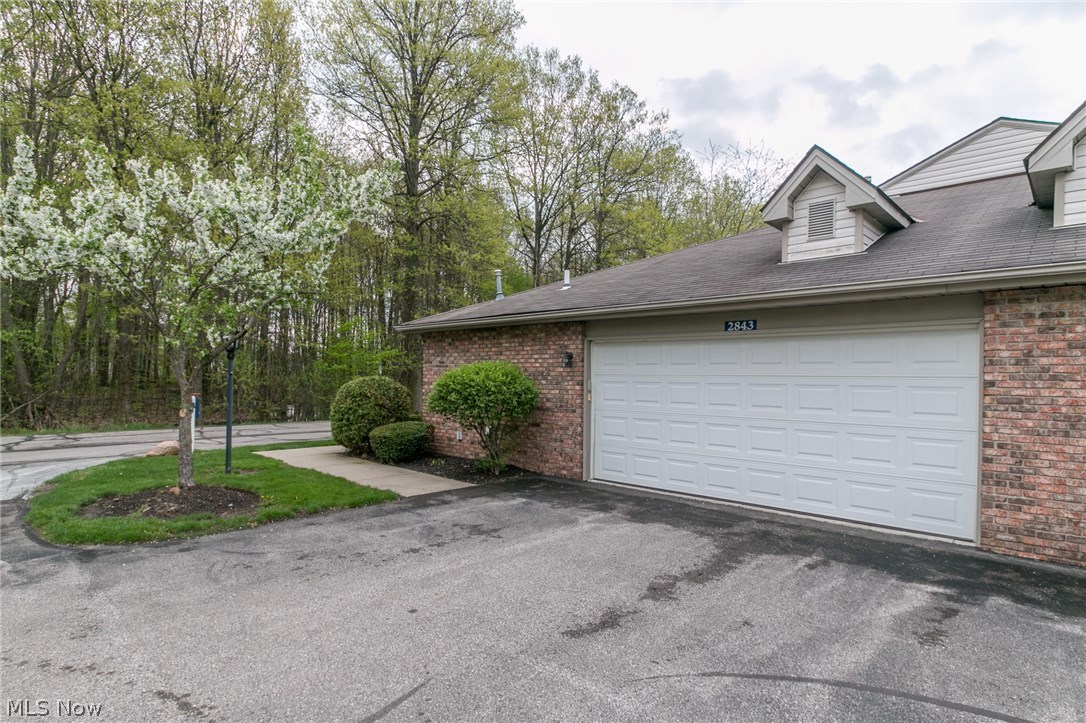 Spacious well cared for Brick Ranch. Open concept with vaulted ceiling in Living Room which shares the same space as the Kitchen and Dining Room. Separate Family Room which could be a Den/Study by adding french doors - if needed. Large laundry area. Master Suite has private bath with large shower and walk-in closet. Bedroom two has EZ access to full bath right across the hall. Attached TWO CAR garage - a rare find to have a Den + two car garage in Devonshire. Private patio next to the dedicated wooded area. Convenient Locations close to shopping Avon Commons & Crocker Park. Amenities include: Exercise room, Swimming pool, Tennis courts, Party room and walking trails. Easy To Show!!!