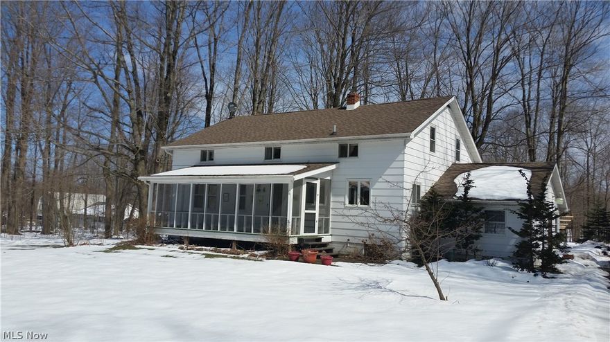 Need room for you and your loved ones? Call to see this 5 to 6 bedroom home on 2 treed acres. Enter into the 22x12 mud/laundry room (new flooring) that leads to the basement or to the  beautifully updated 29x13 kitchen offering Corian counters,  Island with granite breakfast bar, Stainless Steel appliances, laminate flooring, walk-in pantry. Slider lead to private rear deck over looking beautiful treed yard with bar-b-que and tree house. Sizeable 24x15 living room boasts wood floors, abundant light and access to 24x9 screened in porch.  1st floor also includes bedroom, office (or small bedroom) & newly finished full bath. Upstairs comes complete with 5 bedrooms and full bath. Includes 24x32 garage/barn and 2 beautiful acres. Great location in Burton Twp. Livestock permitted. 2 of the Bedrooms upstairs do not have closets.