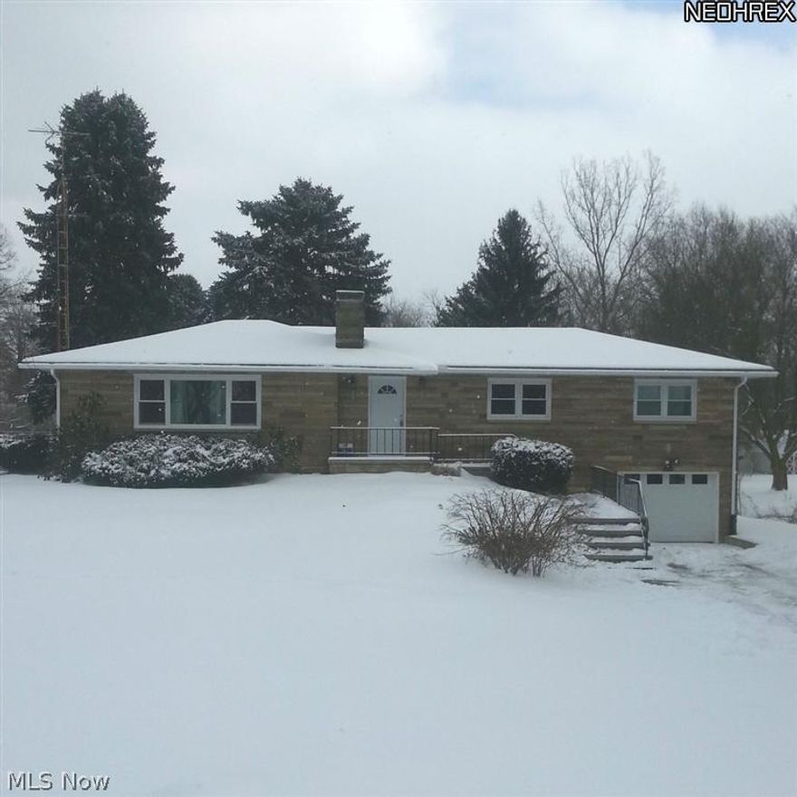 Plenty of room to roam in this 4 bedroom, 2 bath ranch with bonus rec room.  From the pictures you'll notice this home receives tons of natural light.  Features an updated kitchen with newer cabinets, ceramic tile flooring and granite countertops.  Large living room has stone fireplace and an additional fireplace in lower rec room.  This home is a must see and move-in ready!