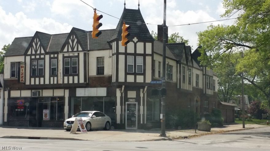 Tudor style building built 1920. Two retail store fronts. Five apartments: Two- 2 bedroom and Three- 1 bedroom units. Boiler 2008. 4 garage spaces. Long standing business in one retail space and one retail space vacant. Call for details.