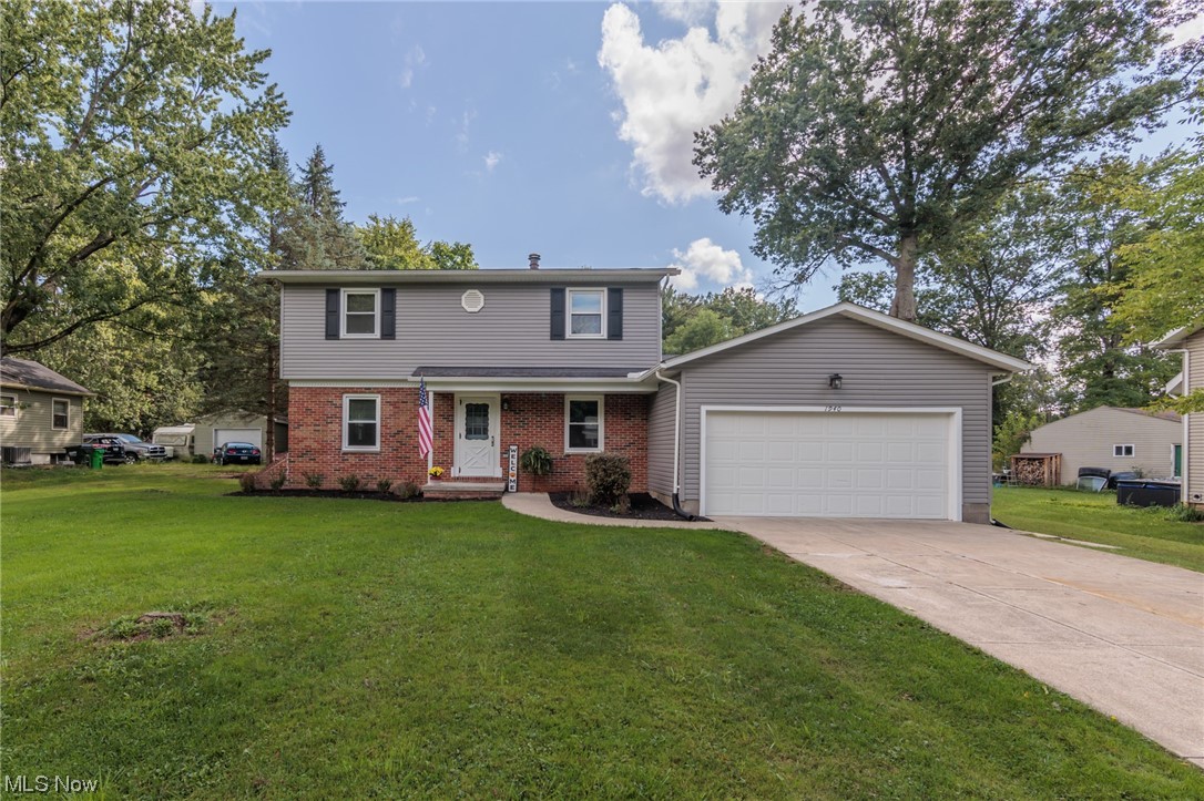 Completely renovated 4 bed 1.5 bath on .88 acres in Stow. The updates are endless! New white shaker cabinets, stainless steel appliances, subway tile back splash and new counter tops complete the spacious kitchen. The open concept kitchen and family room are very much desired. The family room is complete with a wood burning fireplace and sliding door to a new patio over looking the back yard! The down stairs has a large living room and dining room, both with refinished hardwood floors. The upstairs has 4 nicely sized bedrooms all with refinished hardwood floors, new lighting, and fresh paint. You will love the updated full bath with newly tiled shower and new vanity. The home is move in ready, call today to schedule your showing.