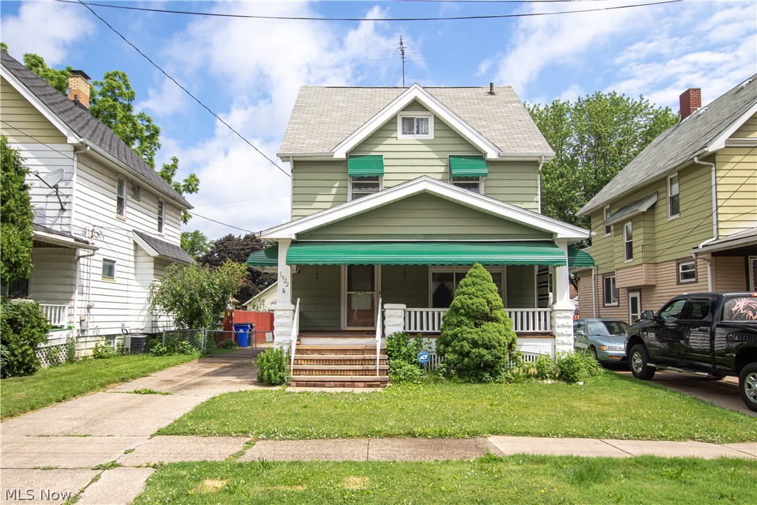 Meticulously maintained home in Cleveland's Old Brooklyn neighborhood. Beautiful original Hardwood floors beneath all carpets throughout the home. The main floor features a large eat-in kitchen with plenty of cabinet space, and a dining room with glass sliders leading to a fenced-in backyard with an oversized garage, equipped with electricity. The spacious living room with plenty of natural light leads into the upstairs where you will find three bedrooms, a full bath, and built-in woodwork storage. The basement offers a fully finished rec room/entertainment space with a full bathroom. Close to Metropark Trails, Metroparks Zoo, Metro Hospital, I71 and 480! Kitchen appliances included. Home equipped with AI Smart Device with 5 cameras (smartphone accessible) and ADT security system.