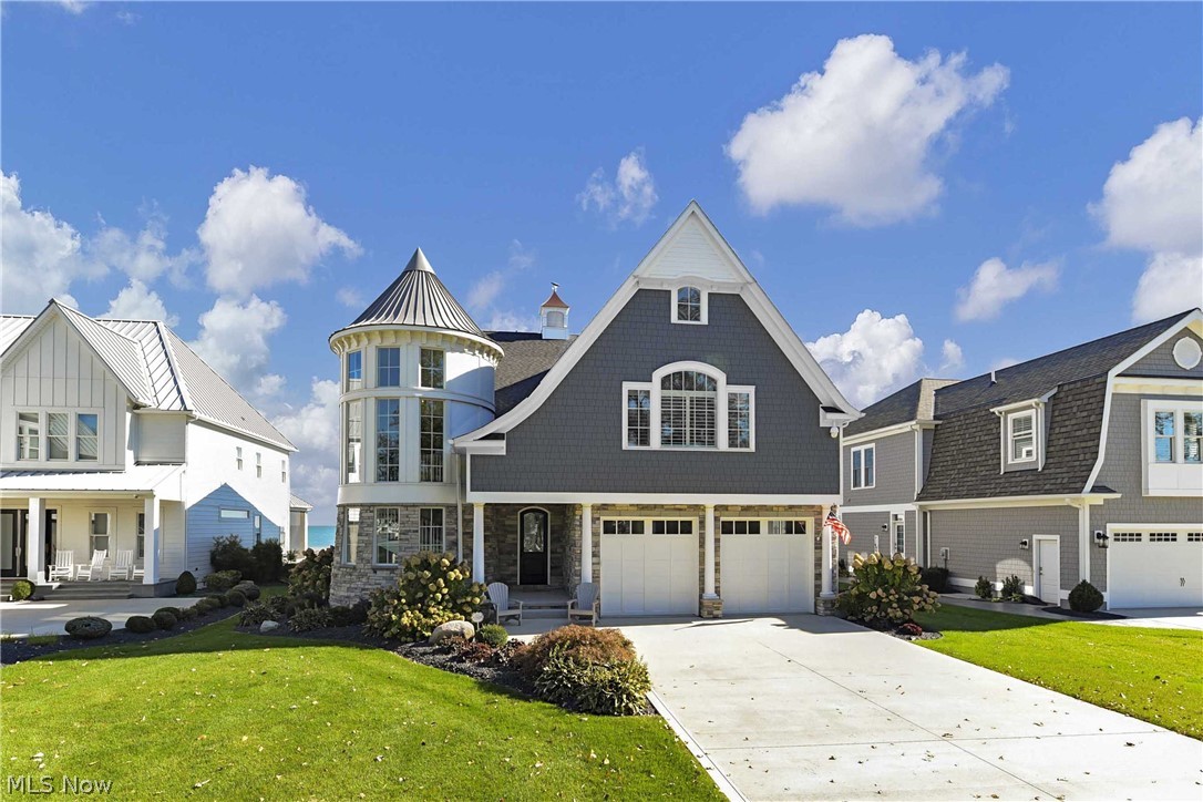 The Ultimate in Waterfront Living! Enjoy the Luxury Resort Lifestyle in the Private Gated Reserve at Bay Point! Spectacular Views of Cedar Point and the Marblehead Coastline! Dramatic 2 Story Turret Foyer has Curved Staircase with Marina Views. Towering 32x19 Two Story Great Room/Dining Room Combo with Coffered Ceiling, Stone FP & Wall of Windows overlooking Lake Erie. Kitchen with Large Island Open to Wine Bar Area with Brick Walls. First Floor Master Bedroom with Luxury Bath & Access to a Screened Porch with Stone FP. Ride the Elevator to the Second Floor with 3 Additional Bedrooms & 2 Full Baths Plus
an Enormous 25x24 Two Story Bunk Room with Custom Wood Beamed Ceiling. Entertain Guests Outdoors with 2 Patios, Screened Porches, Built-In Firepit all Overlooking Lake Erie's Awesome Views! Bay Point Resort Offers Numerous Amenities Including Beautiful Sandy Beaches, Restaurant, Convenient Store, Tiki Bars & 805 Slip Marina. All Homeowners have Access to Clubhouse with Fitness Center &