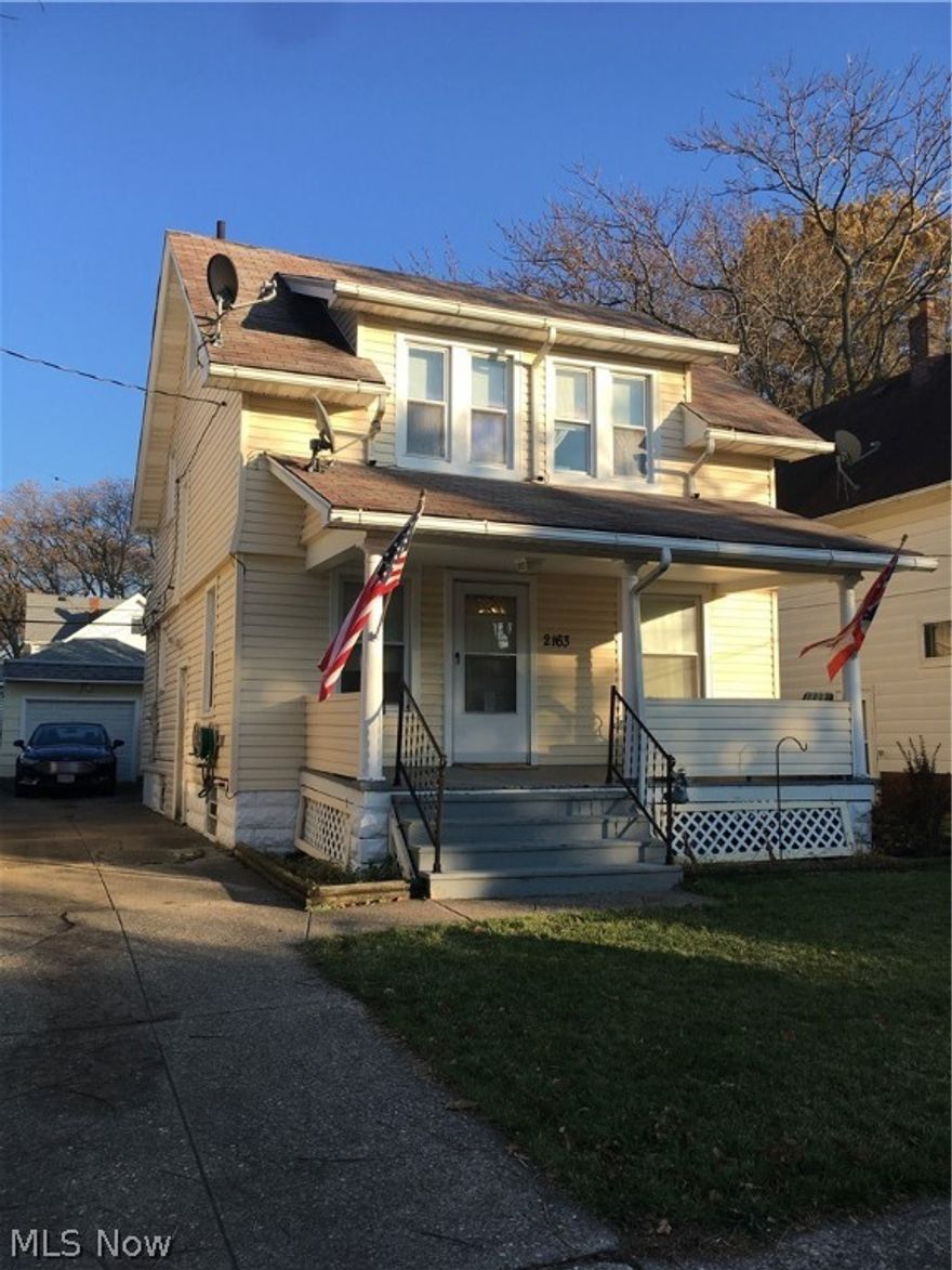 NICELY UPDATED VINYL SIDED COLONIAL!  CLEAN AND SPACIOUS!  NEWER KITCHEN AND GARAGE ROOF AND DOOR!  GLASS BLOCK WINDOWS AND UPDATED ELECTRICAL!  REPLACEMENT VINYL WINDOWS INSTALLED!  LARGE DINING AND LIVING ROOMS!  BASEMENT - WATERPROOF SYSTEM INSTALLED.  MOVE IN READY!