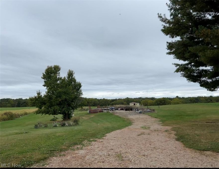 This is a seriously beautiful flat 2 acre building site! The home that was there burned down and there is a well, septic system, driveway and electric ready and available. The shed on-site will stay. You will love the scenic drive, the rolling hills and beautiful farmland.  It's worth your time to drive by and have a look! Get your builder ready, you're going to want to live here!