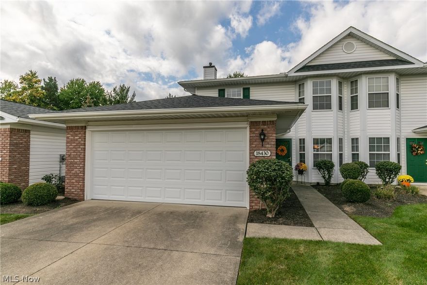 Welcome Home to 18430 Woodhaven Drive.  This contemporary, move-in ready townhouse/colonial is situated on a cul-de-sac green-space lot in the alluring neighborhood of Woodside Crossing/The Woods of Strongsville, which provides convenient access to Pearl Rd, Route 82, I-71, and the Ohio Turnpike, making for a shortened commute to downtown & surrounding communities, or numerous avenues to all the amenities this dynamic city has to offer!  This refreshed, maintenance-free 3 bedroom, 2.5 bath single-family home boasts over 1,700 finished square feet, and is sure to excite complete with great curb appeal, present-day color scheme 2016+, modern light fixtures 2016, newer HWT 2016, upgraded HVAC 2019, luxury vinyl flooring (all bathrooms 2020), 2-car attached garage w/new door/opener 2020, and 12 x 10 concrete patio w/ semi-privacy fence.  Main level offers garage access, a fully renovated half bath, and laundry area w/washer & dryer off the foyer, open to the gourmet eat-in kitchen equipped