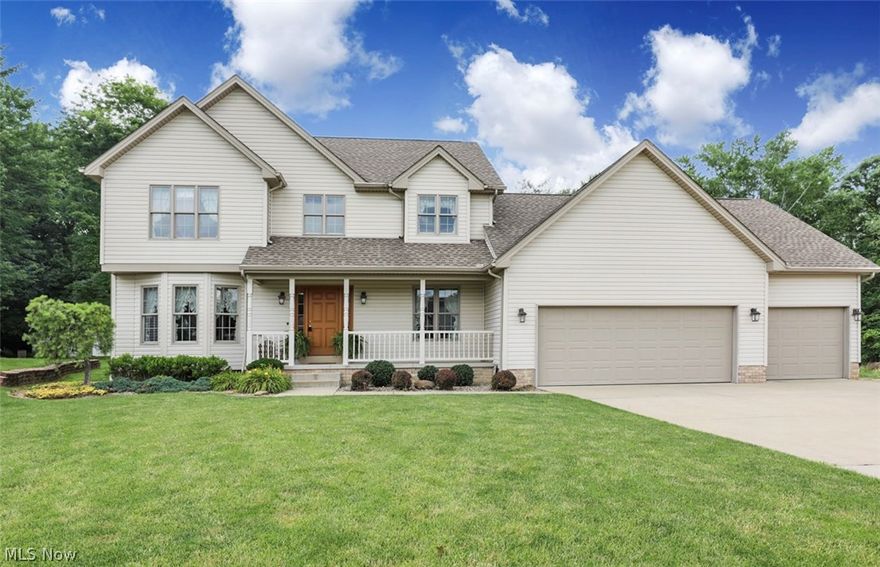 Absolutely Stunning 4 Bedroom/2 Full Bath Home with 3 Car Heated Garage & Spectacular Private, Scenic Backyard in Ridge Lake Development.  Home Features Include:  Awesome Open Kitchen with Center Island, Large Living Room with Fireplace, Formal Dining Room with a Notched Area for a Hutch, First Floor Laundry, & 1/2 Bath.  Second Floor Offers  a Spacious Master Bedroom With Massive Walk In Closet & Large Master Bathroom with Jacuzzi Tub & Separate Shower, 2 other Spacious Bedrooms with Large Closets, & 2nd Full Bath. A bonus room over the garage, which includes a sitting area which leads to the 4th Bedrooms with 2 Spacious Closets. Lower Level offers a Huge Dry Rec. Room Area.  An Awesome Back Deck leads you to the Phenomenal Private, Wooded Back Yard with Above Ground Pool & Picturesque Bridge over to Wooded Area & Meander Reservoir.  Home offers a New Hot Water Tank, Central Vac with kick plate in Kitchen, Anderson Tilt In Windows & Natural Gas Line under deck convenient for Grilling.