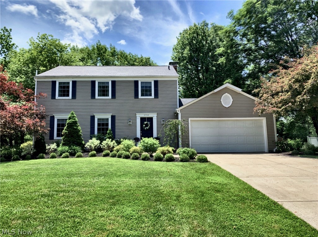 Situated on nearly half an acre of wonderfully landscaped property and walking distance to Barlow Park, 5750 Bradford Way is a fully-updated, custom crafted, Hudson colonial. First floor includes ¾” hardwood flooring and custom wainscoting in family & formal dining rooms with plenty of space to relax and entertain. Feel at home with 2 cozy gas fireplaces w/ custom mantels. Kitchen is updated with custom Schrock cabinets and matching custom banquette with storage, quartz countertops, under cabinet light, stainless steel appliances (including Bosch panel front dishwasher)and a stainless-steel farm sink. A renovated powder room includes vessel sink and granite top. Rounding out the 1st floor is the relaxing sunroom with a vaulted beamed ceiling with large windows that over-look the beautiful, mature landscape and outdoor architecture and fireplace. The fully-renovated 2nd floor, new carpet throughout, has 4 spacious BR's and 2 full baths with Carrara tile floors and new sinks/toilets/van
