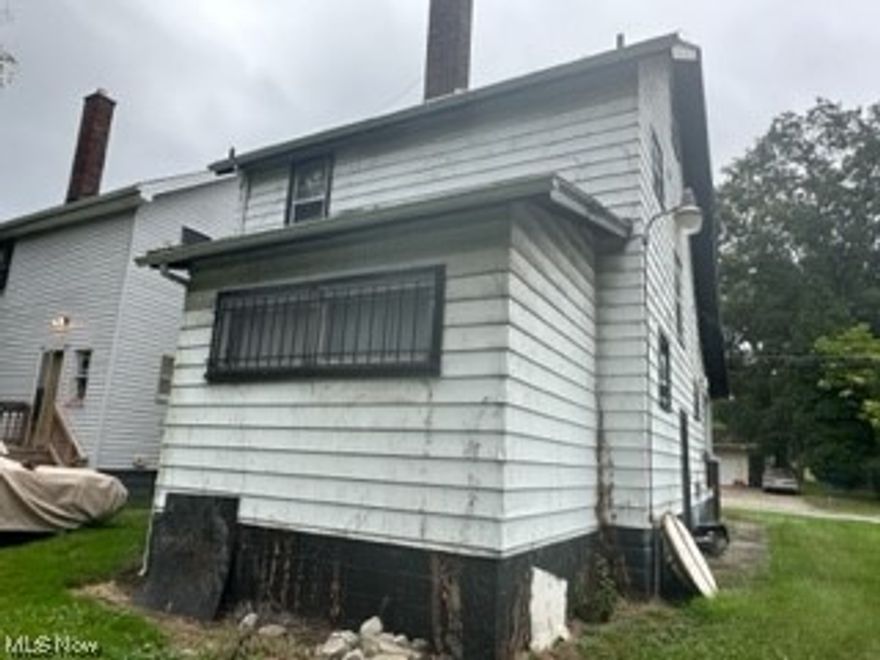 Looking for a home with cove plaster ceilings and beautiful woodwork.  This is the place.  Needs a little bit of touch ups and it could be amazing. 2 bedrooms.  Formal dining room.  Eat-in kitchen.  Covered front porch.  Large 2 car detached garage.