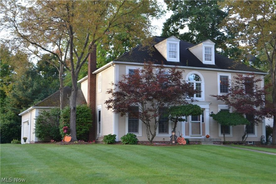 What does this 4 bedroom, 3 1/2 bath, 4 season sun room, custom no maintenance built deck, professionally landscaped corner lot on a cul-de-sac, finished basement with plenty of extra storage in the Award winning Solon Schools have for you??  The perfect place for you to call "home".  The spacious foyer welcomes you with an office to the left with shelves for collectibles and the French doors to the formal living room starts your tour toward the dining room and 4 season sun room. Additional French doors open into the beautiful 4 season, all windows sun room, which includes a vaulted ceiling, fan and slider door to the outdoors. Two additional slider doors from the kitchen and family room, make this a perfect home for outdoor entertaining.  The deck has a gas grill and permanent umbrella for sunny days. The cozy family room has a gas fire place that can be enjoyed from the eat-in kitchen area. Entering from the garage is a large laundry room with shelves/cabinets and 1/2 bath.  The carp