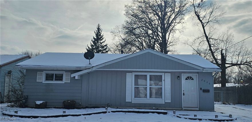 Welcome to your 1959-charmer slab ranch in Lorain! This cozy three bedroom darling has a nice sized front and back yard with a large 2 car detached garage.  Inside, you'll find freshly painted walls and new (2024) vinyl laminate flooring throughout the living/dining room, hallway and bedrooms. The bathroom has an attractive tiled shower and a new toilet. The furnace was replaced in 2022. The dishwasher was recently installed in the kitchen, where you will find plenty of space for all your cooking and gatherings. The cabinets and large pantry provide plenty of space for all your new gadgets and appliances. All three bedroom have lighted ceiling fans. Located just off Route 57 and in close proximity to I-90 and the Ohio Turnpike. Some nearby parks include Lakeview Park and Cascade Park which has water features for children, miles of trails and playgrounds.  Put a bow on this one for yourself for Christmas, and schedule your showing today!