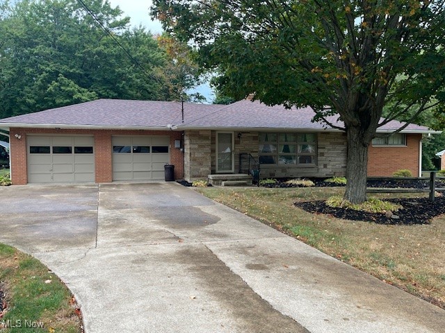 Wonderful well kept Brick Ranch in Marlington School District. This home offers 3 bedrooms, nice size living room, finished lower level and spacious 3 season sunroom that over looks a nice private lot. Call today for your private showing.