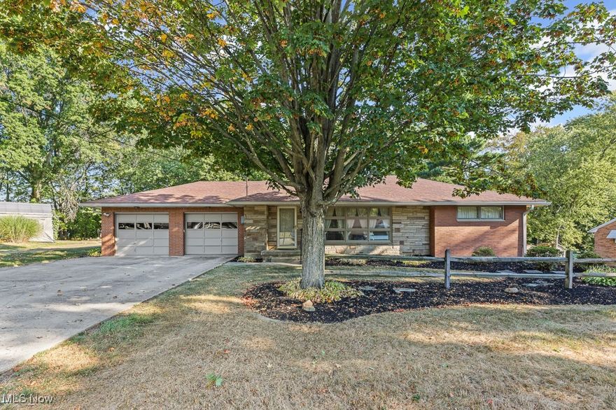 Wonderful well kept Brick Ranch in Marlington School District. This home offers 3 bedrooms, nice size living room, finished lower level and spacious 3 season sunroom that over looks a nice private lot. Call today for your private showing.