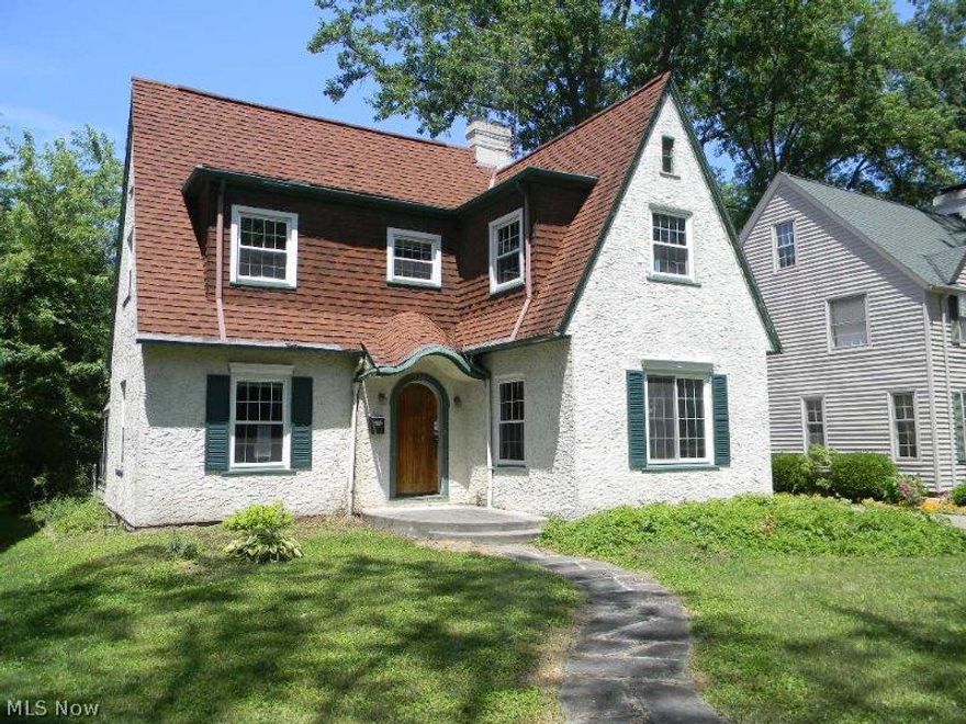 Welcome home to this charming Colonial style home located in Elyria Ohio.  This home has tons of charm.   Stucco exterior with peaks make this home unique. The interior features a large kitchen and hardwood flooring throughout. Screened in porch overlooks the backyard.  Bring your personal touches to make this house a home of your own.