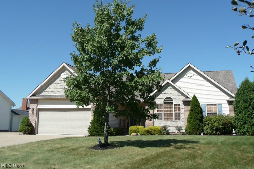 Custom built by RJS in 2001. Brick and vinyl 3 bedroom, 2 bath Ranch with 2 car attached garage. Vaulted ceilings and sky lights, gorgeous crown molding, oak woodwork through out and hardwood floors in kitchen and foyer. Open floor plan offers formal dining room and breakfast bar to include all appliances. 1st floor laundry. Private back yard and deck area