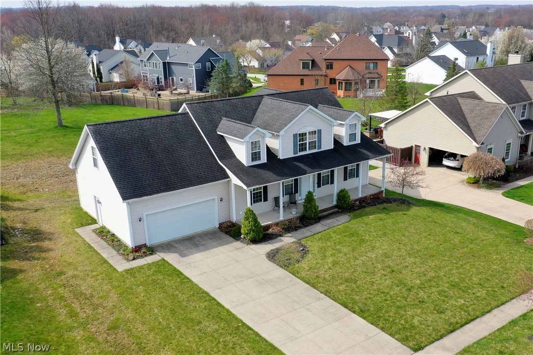 Welcome home to 1180 Windward Lane in Kent, Ohio! Where you will not be disappointed in the bedroom sizes of this home! You will immediately fall in love with this little neighborhood as you're driving to your new home. The Forest Lakes community surrounds a 38 acre nature preserve. Pulling into your driveway you will notice a large porch perfect for unwinding or entertaining! Beautiful hardwood floors are immediately present starting in the 2 story foyer and wraps around into the kitchen. You will see the gorgeous 2 story Great Room with gas fireplace from the front door. A first floor office is to your left and a staircase to your right leads to a large loft area, 3 spacious bedrooms, and a full bath. Heading back downstairs you will walk through the Great Room to get to your master suite. A powder room, laundry room, and eat-in kitchen wrap up the first floor. Immediately off the kitchen there is a slider that leads to the back yard. This home also offers a newer hot water tank and A/C. Schedule your showing today before this gem is SOLD!