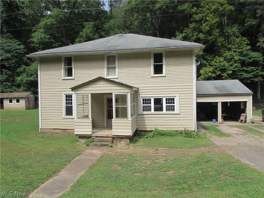 Two homes for one money. The first one is a two story with over 1800 sq ft built in the 1930's as The Goodwill Tavern and converted into a home with 2 bath and 4 bedrooms with a 20x21  2 car garage,  10x16 cellar and cellar house, 8x20 garden shed with outside fireplace, this home is in need of several repairs. The other is a rental home that offers 947 sq ft with 1 bath 4 bedrooms and full basement partially shared as a garage. Located only minutes from US Route 50.
