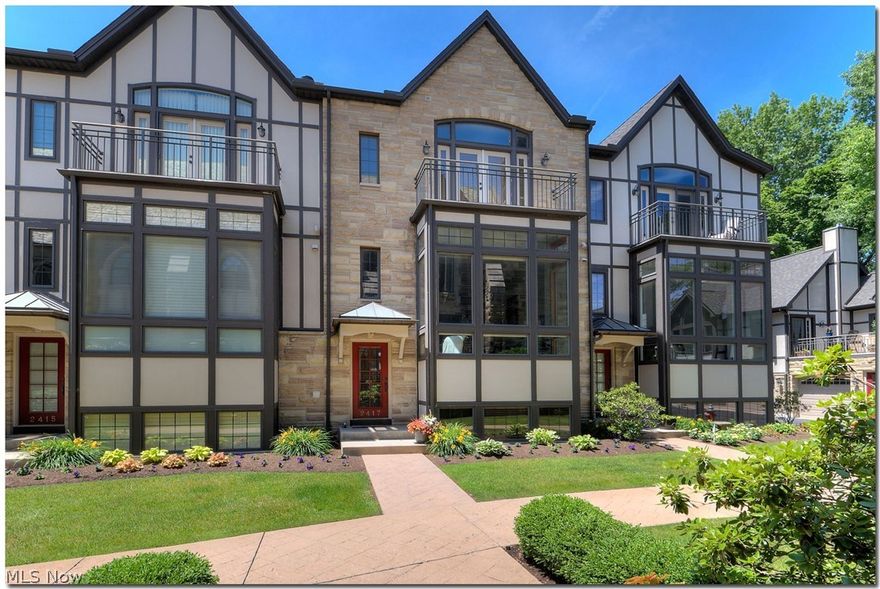 Sophisticated and convenient living at the Top of Cedar Hill in this Derbyshire Court townhome.  Sited in the courtyard which affords quiet and privacy, this home is a short walk to the friendly, historic, Cedar Fairmount neighborhood.   The home enjoys an open floor plan with distinct common areas.  The dramatic great room commands attention with a wall of windows, high ceiling, hardwood floors and built-ins.  The kitchen's large center island provides terrific storage and bar seating.  With loads of storage, a stainless hood and endless granite counter tops, the kitchen is both efficient and attractive.  A beverage station was built to accommodate morning coffee and a wine bar.   From the kitchen, step out to the deck which runs across the entire back of the home.  The casual dining area connects to the kitchen and is perched with a view of the great room. 
Upstairs the private master suite gives you the grand treatment.  An oversized bedroom with two sets of double windows and hard