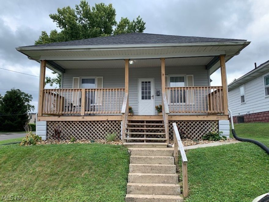 Nice, updated one story home.  Offers living room, dining room, kitchen with stove and refrigerator, two bedrooms and bath.  Enclosed back porch.  Back yard has privacy fence, detached garage and a patio.  Lots of new, remodeled home in 2018, updated bathroom, furnace and central air in December 2017,  new roof shingles on house in 2018 and garage roof just completed August 2020, new landscaping including river rock.  Convenient location to South Zanesville amenities.