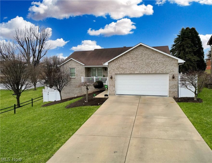 Remarks:  This pristine brick ranch, built in 2010, offers 4 bedrooms and 3 full baths with a modern, open-concept design that feels both welcoming and functional. Upon entering, you’ll immediately notice the maple hardwood floors and vaulted ceilings that enhance the sense of space and natural light throughout the main living area. The kitchen serves as the centerpiece of the home, featuring an impressive 11-foot island, custom cabinetry, quartz countertops, and stainless steel appliances. The open layout flows seamlessly into the living and dining areas and includes walk-out access to the rear deck, making it ideal for entertaining or everyday enjoyment. The primary bedroom provides a private retreat with a spacious walk-in closet and an en-suite bathroom. Two additional bedrooms and a full bath complete the main level. The finished lower level adds exceptional versatility with a massive recreation room, a third full bath, and a fourth bedroom or office—perfect for guests, a home workspace, or additional living space. Outside, enjoy a completely fenced backyard with a low-maintenance vinyl fence, offering privacy and a safe space for pets or outdoor activities. This move-in-ready home combines quality construction, thoughtful design, and timeless finishes in a highly sought-after setting.