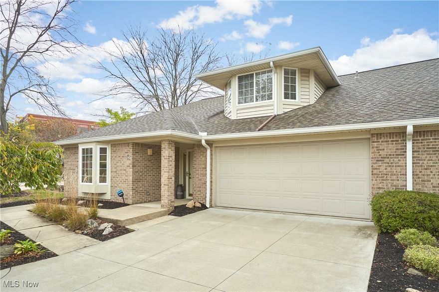 Classy brick condo with 1st floor living in downtown Akron’s premier Townhomes at Canal Park association! Featuring a two-story living room & dining area w/ wall of windows allowing for abundant natural light, living room with gas fp & door to private paver patio, cozy kitchen w/ granite counters, gas range & breakfast bar, master suite w/ WIC & full bath, additional guest bedroom and full bath, and laundry room w/ washer & dryer that stay! This condo also has a 2nd floor loft that would make great office space, w/ a WIC for extra storage, and plumbing for adding another bath. Maintenance free living plus a 2 car attached garage w/ added shelving! Conveniently located < .25 mi from the Ohio & Erie Canal Towpath Trail & Canal Park!