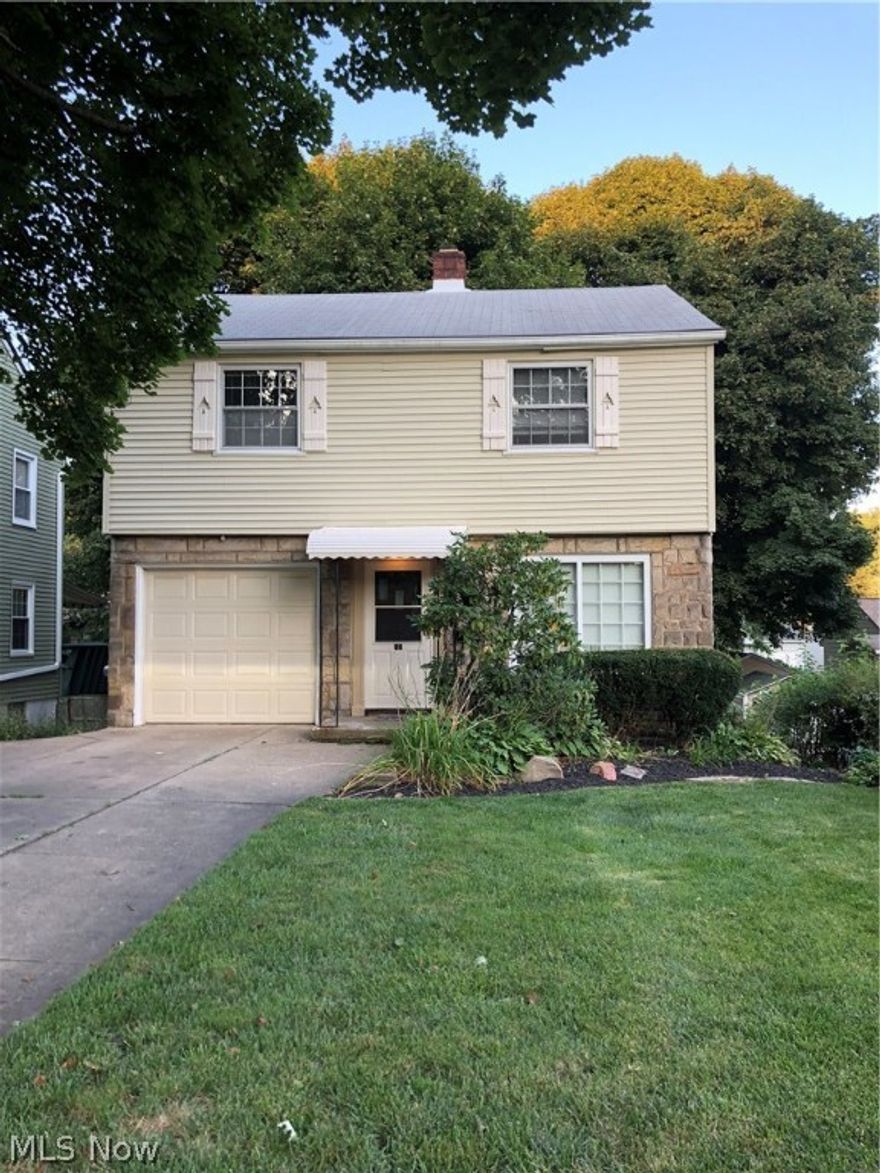 Dont miss this adorable Colonial, boasting a sunny living room, nicely sized bedrooms, 2 full baths and a full finished walk out basement! This home is conveniently walking distance to all that Wallhaven has to offer including the New Whole Foods Plaza and Swensons!!  Absolutely charming home with an attached garage- AND a detached garage!  Great storage in the walk up attic. Full finished Walk Out basement with a full bath!  Huge lot is actually 3 parcels that connects all the way through to the cul de sac on Sabetha Place....Maybe add a driveway off Sabetha and use the back garage for parking too?!?  So much potential with this house and lot, and priced to sell!!! Dont miss it!