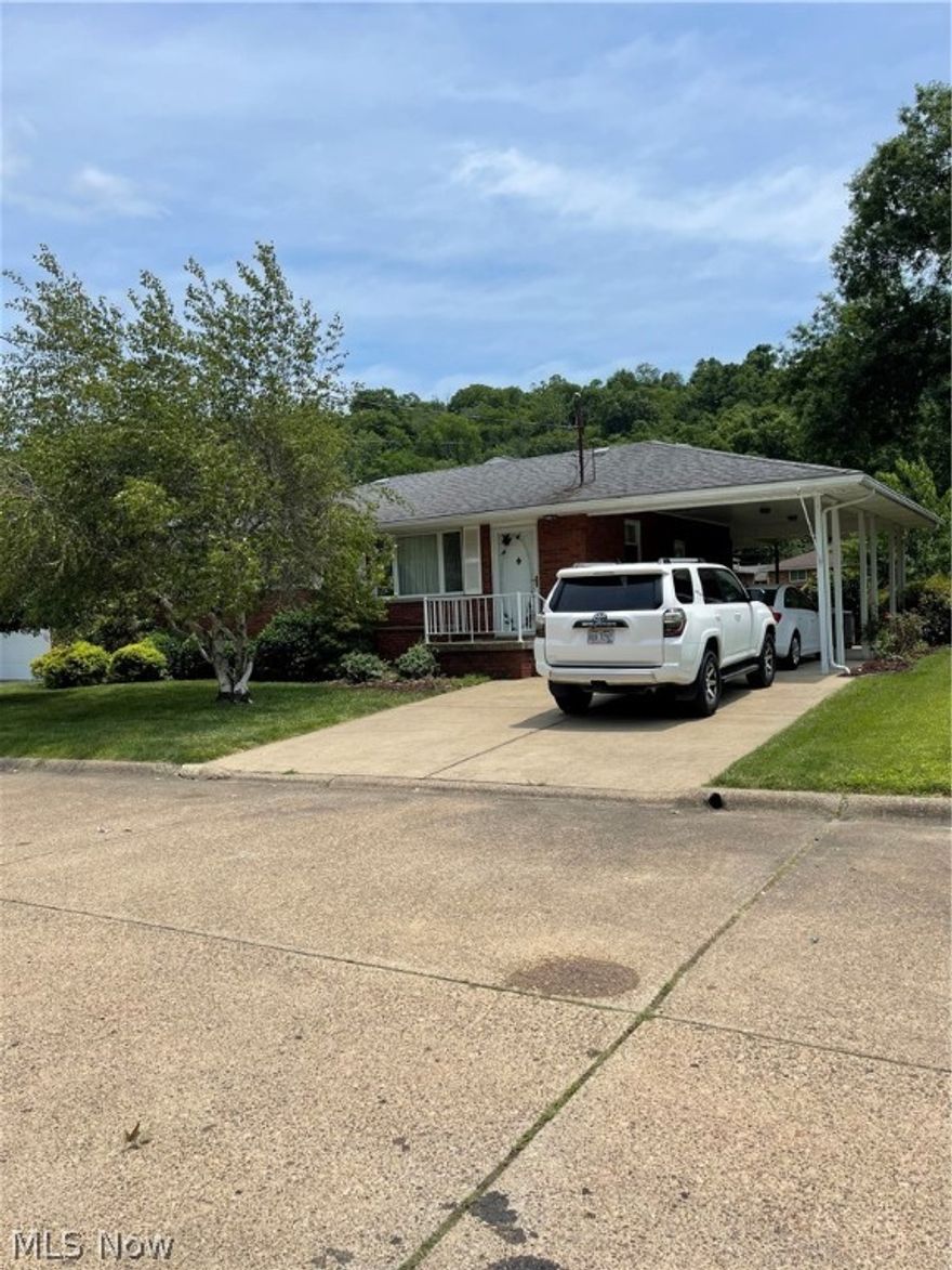 All brick ranch with rear room addition. First floor living. Three bedroom 1 1/2 baths.  Built in appliances stay.  Carport, shed. Partially finished basement with fireplace. Basement storage/utility area is unfinished. Convenient Vienna location. Easy to show! Possession with deed.