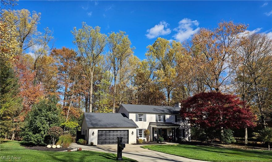Welcome to 2385 Oakway Street NW — a beautifully maintained five-bedroom home in North Canton’s highly sought-after Bob-O-Link neighborhood. Set on a private, parklike .83-acre lot, the residence blends classic architecture with today’s comfortable updates. Inside you’ll find an inviting two-story foyer, new luxury vinyl tile flooring, and brand-new carpet. A formal living room and family room each feature a gas fireplace. The kitchen showcases warm granite countertops, stainless-steel appliances, and a pro-style gas range. Adjacent is the laundry with butcher-block counter and a convenient half bath in the rear hall off the garage; a second half bath serves guests. Upstairs are four bedrooms and two full baths, each updated with new quartz counters. The primary suite includes a walk-in closet with dressing area. The finished lower level offers flexible recreation/office space, a fifth bedroom, and a partial second kitchen area (refrigerator, stove, microwave, counters & cabinetry). A dedicated staircase leads directly from the garage to the basement. Outdoors, enjoy a custom brick patio with outdoor kitchen and firepit overlooking mature trees. A 12×16 shed with roll-up door provides easy storage. Only four minutes from Main Street, with top-rated North Canton City Schools (7611). Beautifully maintained home ready for immediate sale.
