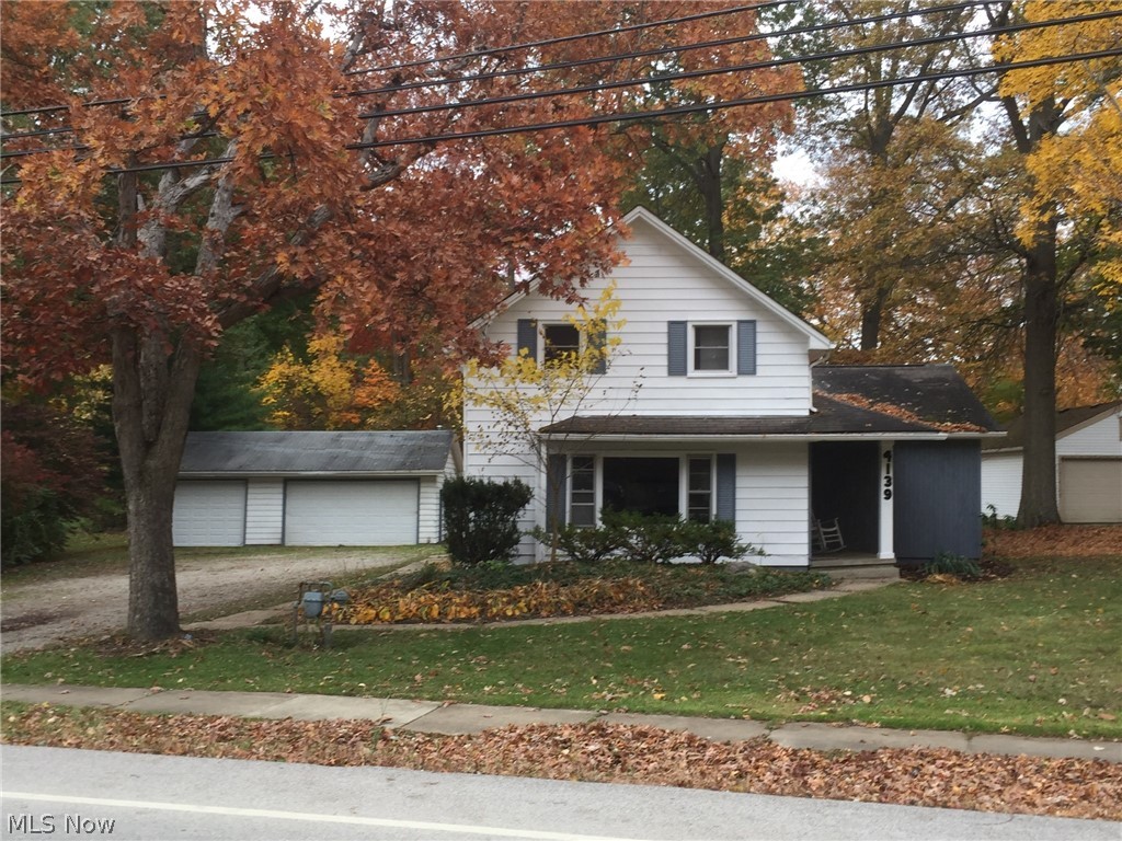 Rare find in the heart of Stow! 4 bedroom 2 full bath home with 3+ heated car garage. This garage is huge - approximate size is 34' x 28' (extra deep) & has a newer gas forced air furnace - perfect for a mechanic or woodworker. The home is remodeled & offers 1st floor bedroom, 1st floor full bathroom, and 1st floor laundry. First floor master has dual closets and access to 2 tiered back patio and full bathroom. All new paint and flooring throughout. Updated eat-in kitchen with new counters and back splash, updated bathrooms with tile flooring, newer furnace, updated 150 amp electric panel, Hot water tank 2018, sump pump replaced 2020, extra large driveway, exterior of home painted 2020, garage doors replaced 2020, over 1/2 acre lot, toilet in basement could turn into another bathroom. Upper concrete patio is 12' 8" x 12' 8" and lower concrete patio is 12' 8" x 12'. Very convenient location close to shopping, city hall, schools and amenities. Schedule your visit today.