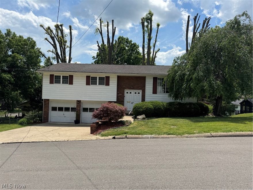 Celebrate the 250th near the City Park and watch fireworks from your screened porch! This brick bi-level features 3 bedrooms, 2.5 baths, large living room, dining room and the kitchen features an island with the perfect place for breakfast. The lower level includes a large family room with woodburning fireplace and laundry room. This is a must see, spacious home so call for your personal tour!