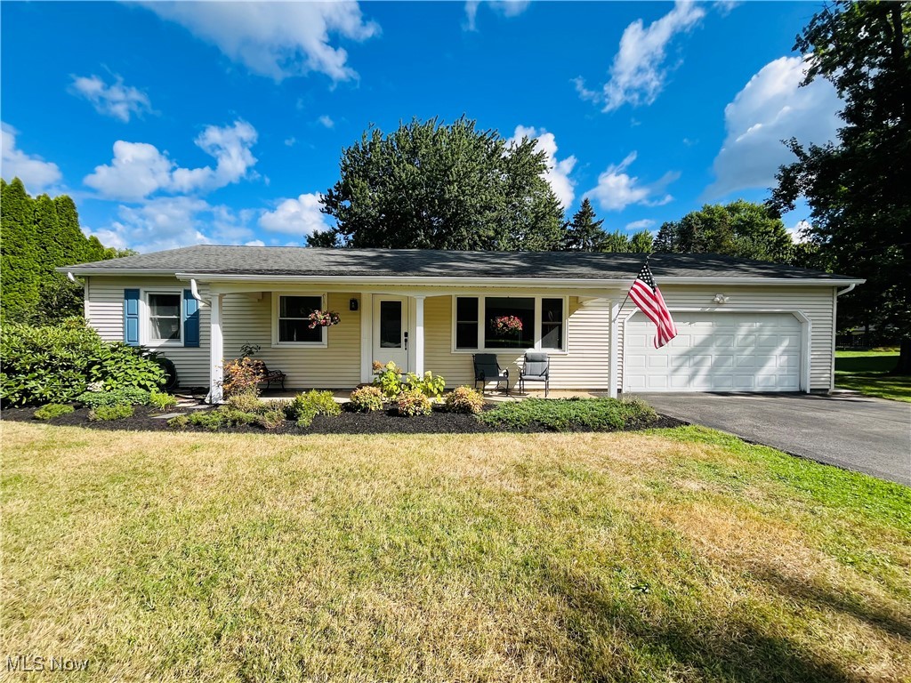 Welcome to this updated and move-in ready ranch. A rare one-floor living solution, this comfortable 1800 square foot home on .52 acres offers a large renovated kitchen, appointed with cooktop and hood, as well as a Jenn-Air oven. Many Kraft-Maid custom cabinets, butler's pantry, and the built-in pantry around the refrigerator - all provide ample room for storage and stock. Expansive counter tops, and a picturesque window overlooking the back yard. French doors to the kitchen-adjacent den with fireplace and brick mantle. Multi-functional study/ music room, or ready-made guest quarters... and right across the hall from the second full bathroom. Many renovation updates over the past several years include hardwood floors, kitchen, both bathrooms, sliders to the deck, and new roof over the addition, and so much more. Big, bright windows in front and back of the home. Private back yard, pine trees, garden, and a large beautiful focal point Silver Maple. Built-in storage in the garage, and recently resurfaced the blacktop driveway. Neighborhood living; near the Village, YMCA, parks, restaurants, shopping, and schools.