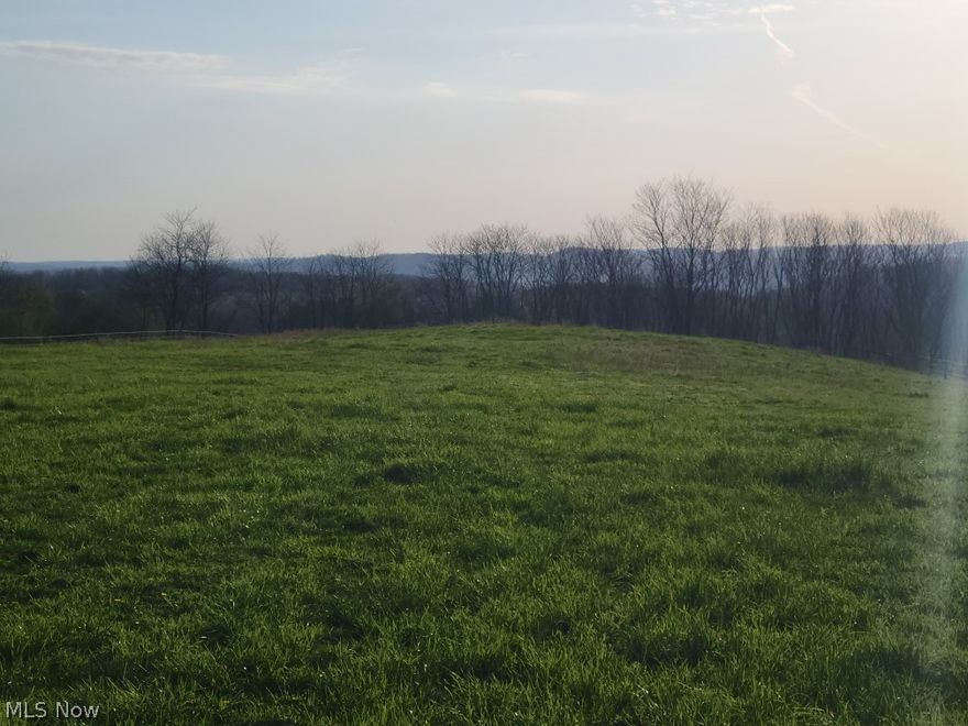 Approximately 30 acres with amazing views. Nice flat area on top for building. Mineral rights are being withheld by seller. Convenient to 77, 10 Minutes to New Philadelphia and 15 minutes to Canton. Call today to walk the property