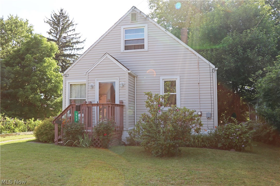Super charming Ellet Cape Cod. This home has been loved and well cared for. Recent roof, siding, gutters and windows. Lovely private back yard with beautiful flowers and fresh mulch. Front entry has a nice corridor for shoes and coats. Newer carpet through living room, hall and bedrooms. Nice open floor plan with living room opening into the dining area. Nice kitchen with newer laminate floors and ceiling fan, gas range and refrigerator stay. Two nice sized bedrooms on the main level and the larger master bedroom on the second. Larger bedroom has a very large closet and built-ins. Bathroom has newer toilet, vanity, surround, flooring and vent. Linen and coat closets in the hallway. Hardwood floors under carpets. Large open basement offers tons of storage and the potential to finish for more living space. Glass block windows, hot water tank new 2015, undated electrical and fruit cellar. Please forgive the boxes on second floor.