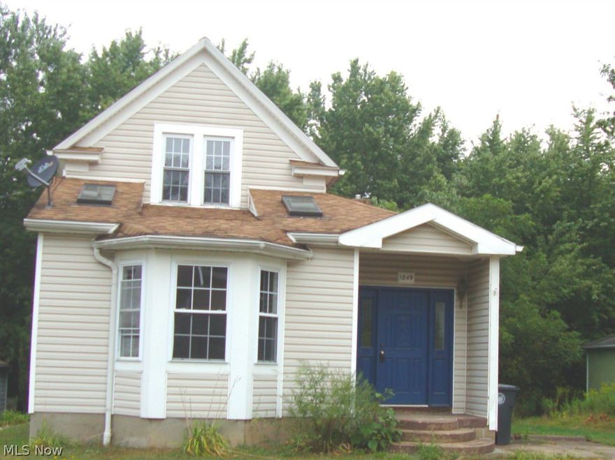 This terrific Ellet cape has 3 bedrooms, and 2 full bathrooms with an expansive great room where sky lights brighten an already warm living space.  The first floor bedroom and full bathroom make this an easy decision for any buyer.  The deck off the back of the home looks onto a 2 car detached garage tucked into the wooded lot.  Bring a washer and dryer to make this your new home!