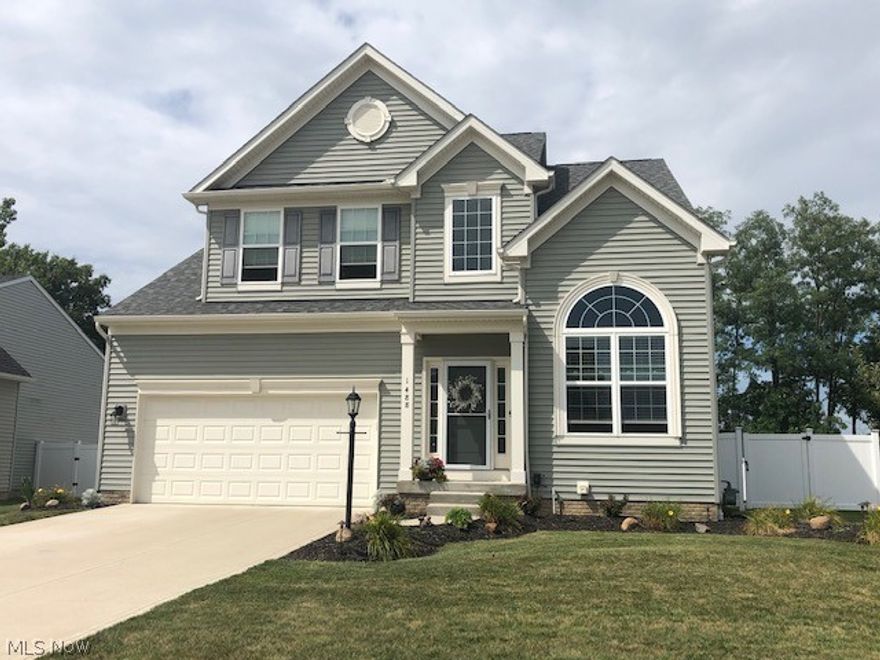 You will be impressed by this 4BR, 2 1/2 Bath, DREES built colonial home in Brunswick Hills (no city taxes). Open floor plan with vaulted ceilings and neutral décor throughout.  The spacious kitchen boasts beautiful hardwood floors, quality cabinetry, stainless steel appliances, granite countertops and center island, which opens to the morning room offering a plethora of sunlight, perfect for dining. The front room makes a great office area or sitting room. A generous owner's suite includes a nook for extra space and character. The owner's bath features double sinks, walk-in closet, soaking tub, and separate shower. There are 3 additional good size BRs and a full bath upstairs. First floor laundry with washer and dryer. The wonderful landscaping can be appreciated from the curb or while relaxing on the oversized, stamped concrete patio under the canopy, curtain-screened gazebo surrounded  by the 6' high, low maintenance vinyl privacy fence with solar lighting or when playing in the 4'