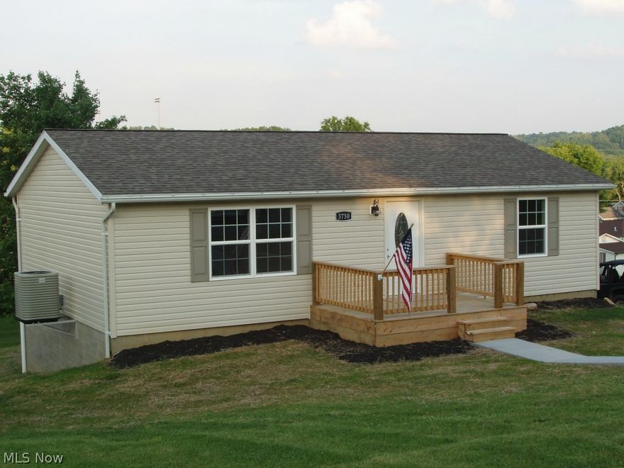 Lovely, updated 2 or 3 bedroom home with custom stone electric fireplace. Ceramic tile in bathroom and kitchen. All new kitchen cabinets and stainless steel appliances. Pantry in kitchen. New carpet throughout, new roof, new siding, new furnace, new insulated garage door, new low E windows, new sidewalk. Fireplace mantle is ready to place your tv above it.  Central air and ceiling fans throughout. Closets are deep and 8 feet long. Additional 400 square feel of finished living area in the basement with a walkout door. Complete foundation was sealed and new drain pipe added along with 60 ton of river gravel at a cost of $8,500.00. This house has lots of quality and is ready to move into and to start enjoying living there immediately. Assessment is for the annual $12.00 Watershed Assessment that is included with the property taxes.