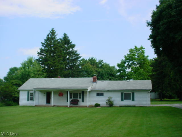 All on one floor! 2 bed, 2 bath ranch on 2 acres! 20 x 30 barn with horse stall & 12' ceiling! 2 car attached garage! 2000 masonry fireplace w/gas starter! Ceramic tile in kitchen & eating area! All appliances stay! 2nd bath off laundry! Electric updated, July 2014! Large living room with built in book shelves w/outlet! Pull down attic storage! Enclosed rear porch/sun room! New septic system being installed.! Loyal Oak area of Norton!