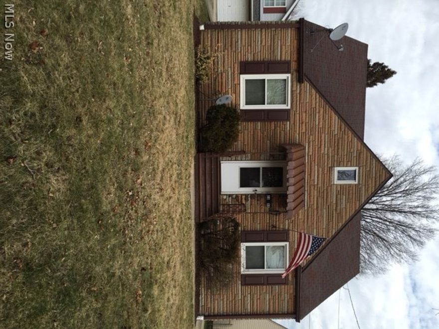 Charming stone cape cod in Firestone Park! This home has recent updates and has been freshly painted with new carpeting! Updates  2016 are: carpet and paint, 2015: new furnace, electric service. Other updates include: updated plumbing , air conditioning and windows. This home has a large double car garage, patio and a fenced yard. Great buy in a nice area! Basement was just waterproofed March 2016