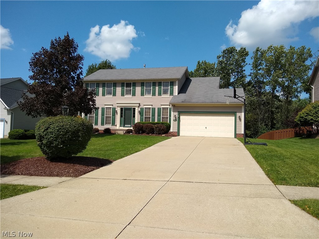 A wonderful Eaton Estates center hall colonial with 4 bedrooms, and 2.5 baths. This home features over 2700 total square feet of living space with the finished basement. A lovely fireplace highlights the large family room. The kitchen is open, and features a center island. Each of the bedrooms is spacious, and the master suite has a garden tub. There is plenty of storage, a first floor laundry, 2 car attached garage, large deck, large yard, and so much more.