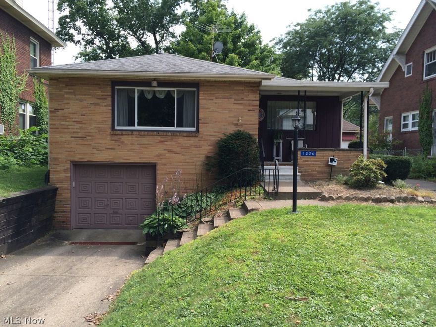 Buyers will like the central location, convenience, and the excellent city services provided. This home has a decorative fireplace, a two car tandum garage, newer front porch steps and a shower & commode in the basement.  Updates include: 2014-glass block windows, upgraded electric;  2013-painted kitchen;  2011-new water heater;  2006-new carpet throughout;  2004-new roof, furnace and central air;  1993-new kitchen windows;  1992-new vinyl siding. POSSIBLE $2000.00 DOWN PAYMENT ASSISTANCE.