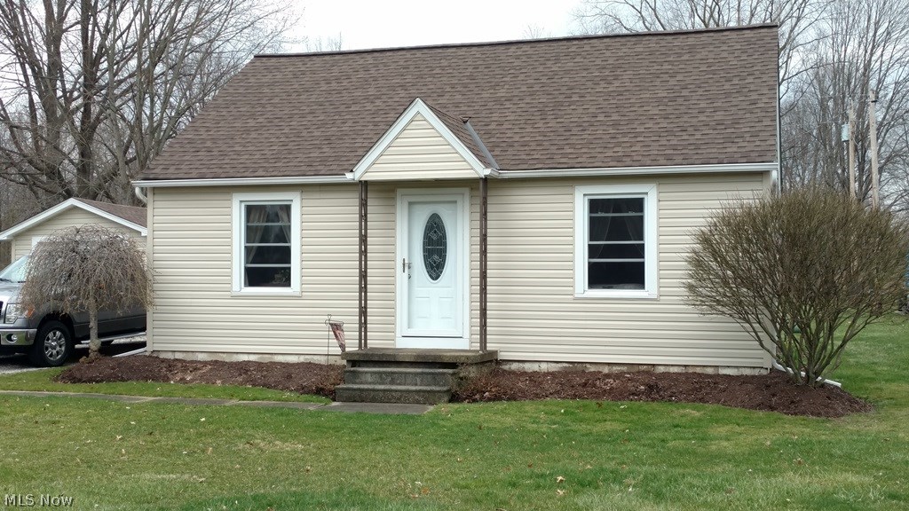 Many updates in this cute Grafton bungalow that sits on .88 acres with big mature trees in the back yard with no neighbors behind you. Newer roof, windows and furnace with central air in the last 5 years. The first floor has 2 bedrooms and living room with hardwood floors, kitchen and utility room with vinyl flooring. The upstairs third bedroom is carpeted and has a huge closet/dressing room. Sitting across the street is the Grafton Community Park that has a playground, basketball courts, pavilion and splash pad.