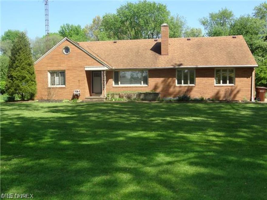 All the quaintness of a cozy neighborhood and all the convenience of location, this surprisingly spacious home is perfect all the way around.  Nestled into West Avondale, yet less than 5 minutes from banks, grocery store, pharmacies and the shopping mall,  it’s location is one to be envied.  And it’s only topped by the spacious and contemporary renovations recently completed.  

Once inside you'll marvel at a newly renovated kitchen with all the modern amenities (natural hickory floor to ceiling cabinets with roll out shelving, quartz countertops, gas cook top, electric double wall oven).  The kitchen is open to a very large dining room, big enough to accommodate a 12' dining table with room to spare. Both look out, and have access to, a beautifully landscaped stamped concrete patio, great for entertaining. Also on the first floor is a large living room with gas fireplace and big picture window, large bedroom which could also be used as a first floor office, and a large newly renovat