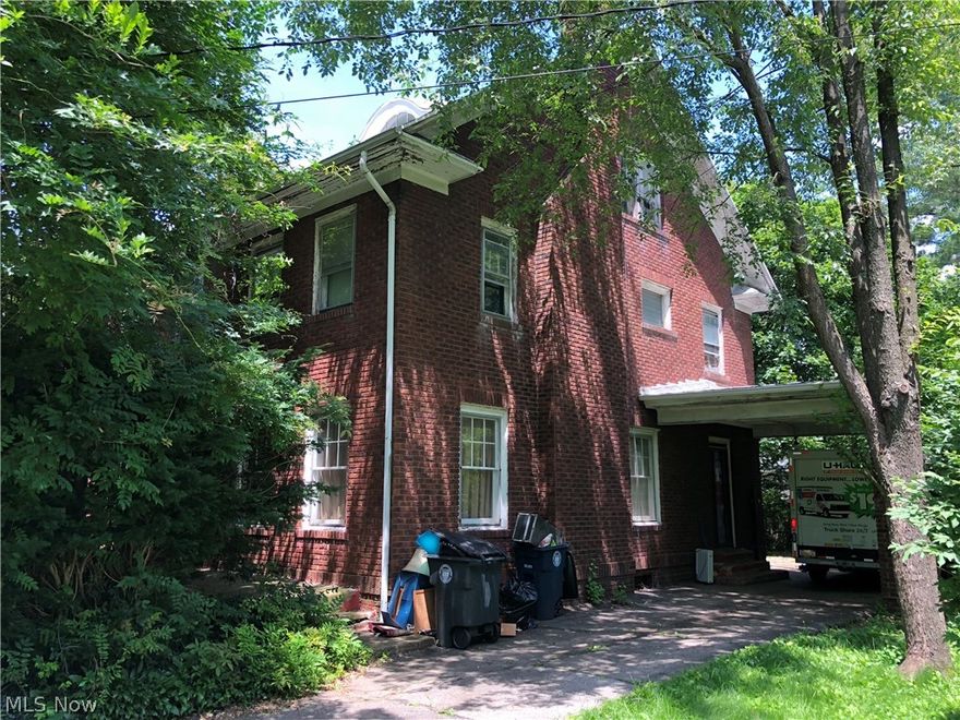 The definition of a fixer upper here on N Highland! ,BUUUT this property could be FANTASTIC!!  Built in the roaring twenties, it's searching for its new energetic owner to bring it back to prominence!  Surrounded by beautiful properties we feature~ A large living room with a great fireplace, formal dining room, 2 and a half baths, All brick exterior, over 3000 sq ft, full finished attic, lots of closets, close to all kinds of activities in Akron's Highland Square.  We do need fixing up here!  Buyer to check with health department for possible work orders.  Call Today! for a private viewing!